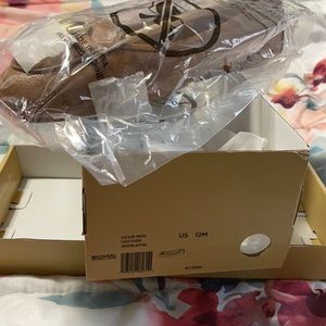 Size 12 Acorn colored. Brand New in the box.